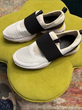 Sorel White Mesh Slip-On Sneakers with Black Strap and Yellow Accent